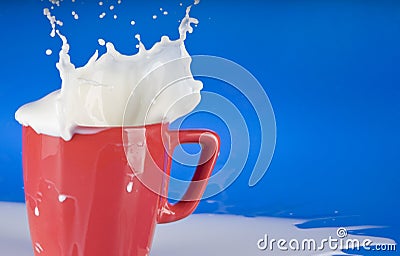 Milk splash out of red cup