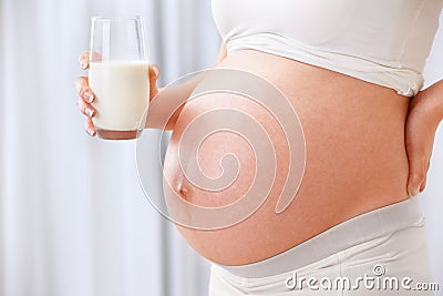 Milk and stomach of pregnant woman