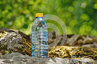 Mineral water in a bottle on a hot day