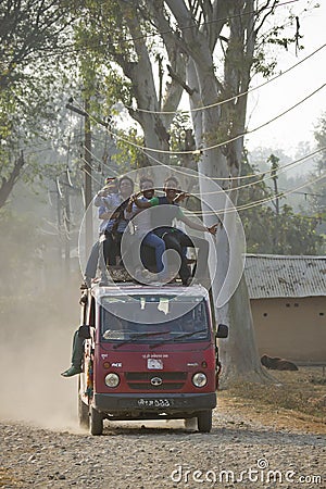 Mini van over charge of people in Nepal