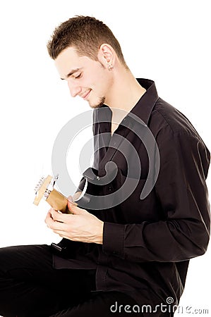 Mischievous guy plays the electric guitar