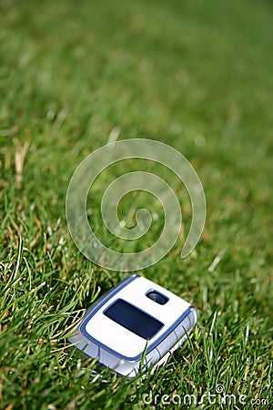 Mobile cell phone on grass outside