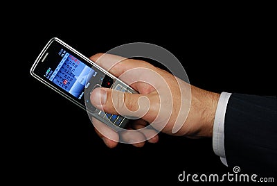Mobile phone in hand isolated with path