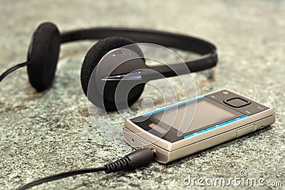 Mobile phone with headphones
