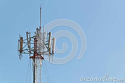 Mobile Telephone pole with light blue sky
