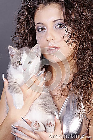 Model in silver with cats