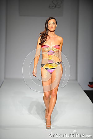 A model walks the runway at Skinny Bikini show