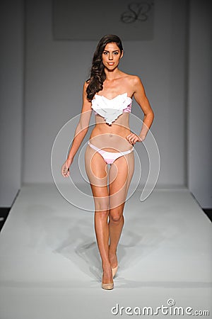 A model walks the runway at Skinny Bikini show