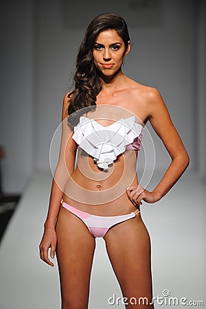 A model walks the runway at Skinny Bikini show