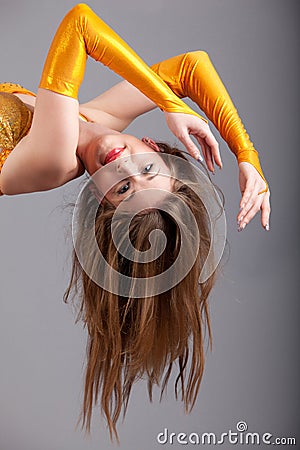 Model in yellow shine dress hang down