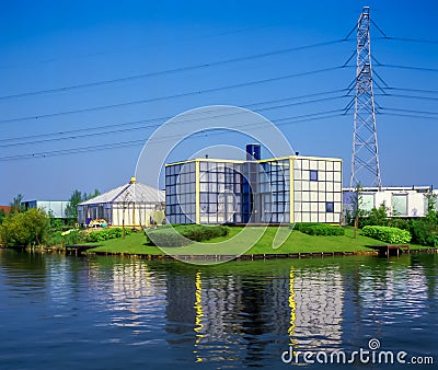 Modern architecture near high tension power lines,