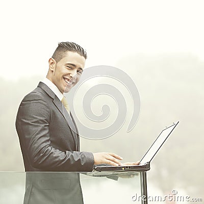 Modern businessman at the office balcony