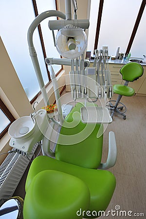 Modern chair and tools in dentists office
