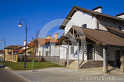 Modern detached family houses at street