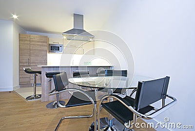 Modern fully fitted kitchen with dining area