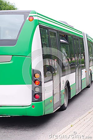 Modern green urban bus