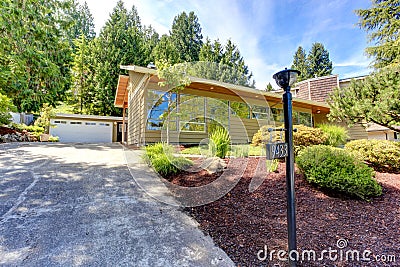 Modern house exterior with curb appeal. View from driveway