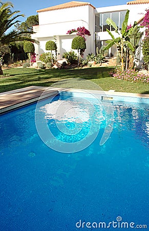 Pool on the Backyard of a Modern Luxurious House