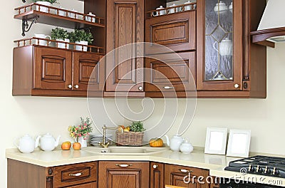 Modern kitchen interior with white and brown decoration
