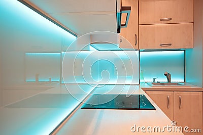 Modern luxury kitchen with blue LED lighting