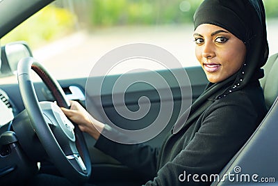 Modern muslim woman car