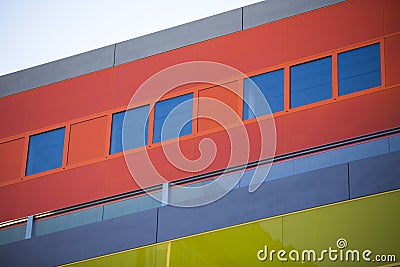 Modern office buildings. Colorful buildings in a industrial place. Red windows.