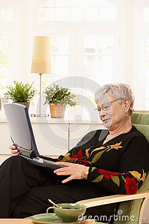 Modern pensioner with laptop