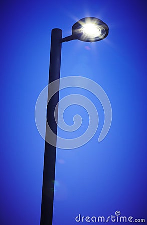 Modern street lamp by night