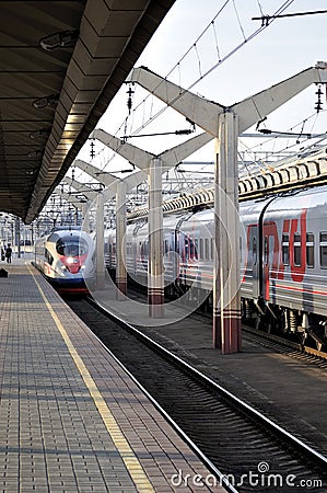 Modern train Sapsan arrival on station in Russia, Saint Petersburg