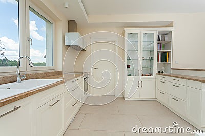 Modern white kitchen with granite tops