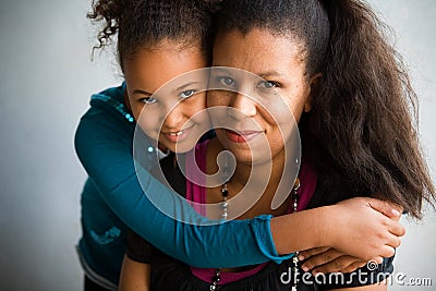 Mom and daughter hug