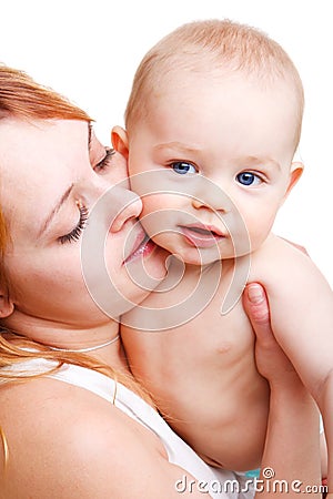 Mom kissing son