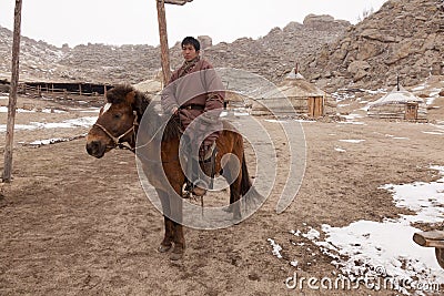 Mongolian horseman and ger camp