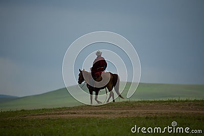 Mongolian Nomad on horse sky