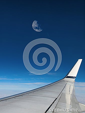 Moon in airplane window