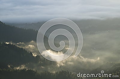 Morning clouds over villages and forests