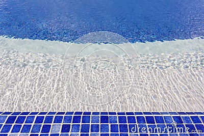 Mosaic tiles in the pool with water. The hotel for recreation.