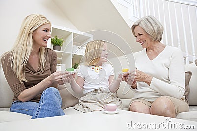 Mother, Daughter, Grandmother Family Drinking Tea