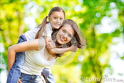 Mother and daughter in park