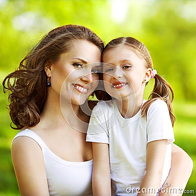 Mother and daughter in park