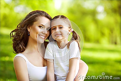 Mother and daughter in park