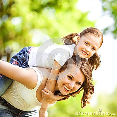 Mother and daughter in park. Mother Day.