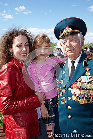 Mother, girl and veteran of Great Patriotic War
