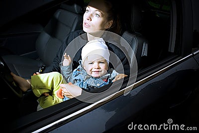 Mother and son in a car