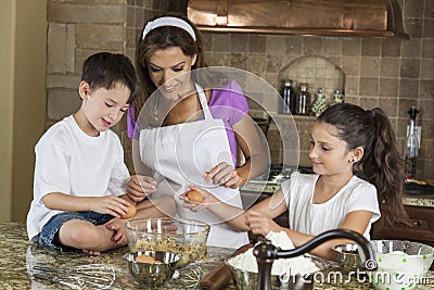 Mother Son Daughter Family Baking In A Kitchen