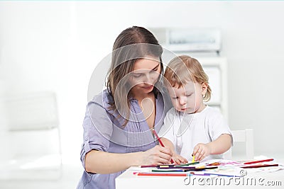 Mother and son paint