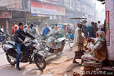 Moto drivers on the street with crazy traffic of people