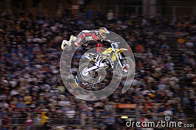 MOTOCROSS EXTREME SPORT STUNT RIDER ON A DIRT BIKE