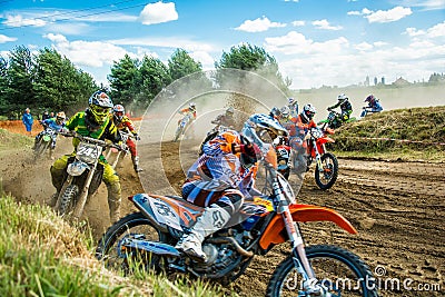 Motocross riders on the race