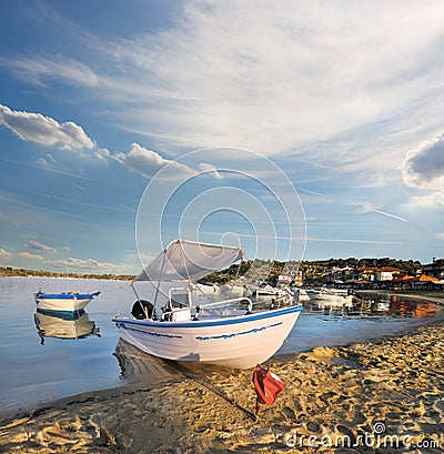 Motor boat in Ormos Panagias bay in Sithonia, Greece